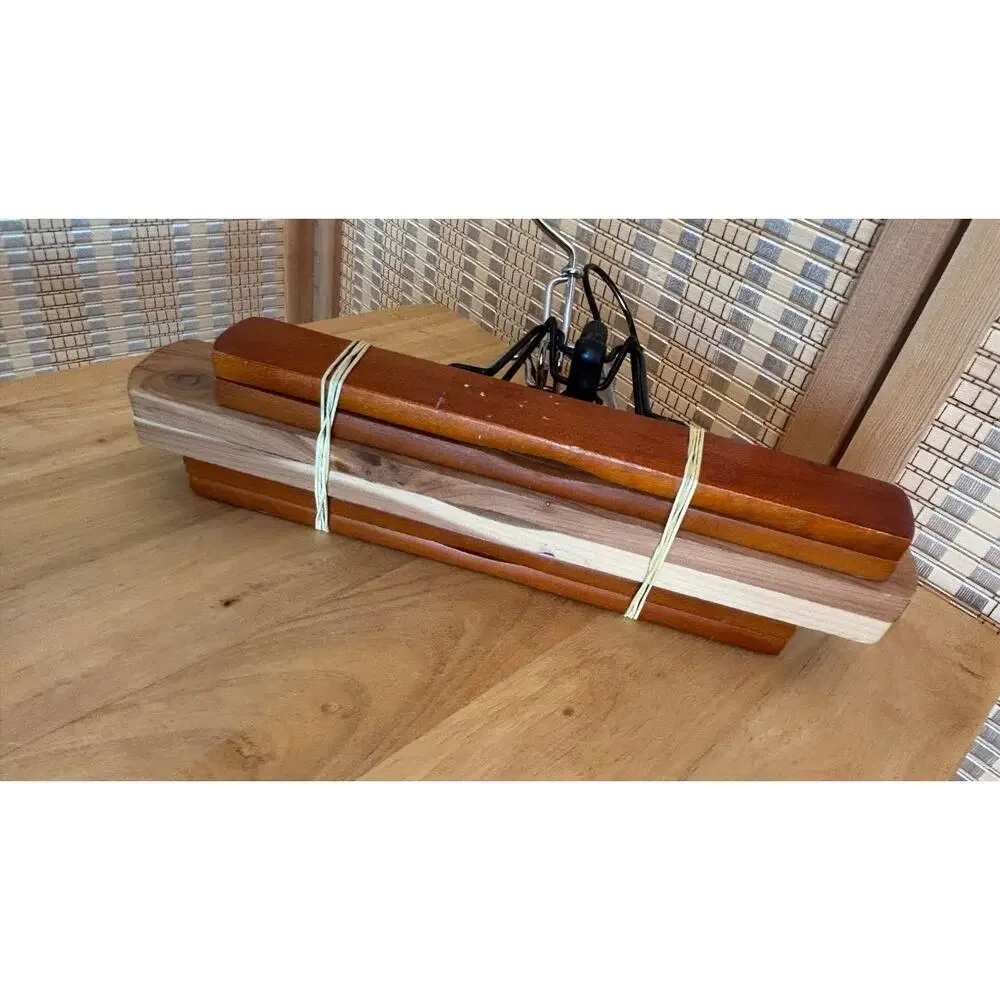Woodlore Three wooden trouser and skirt clamp hangers